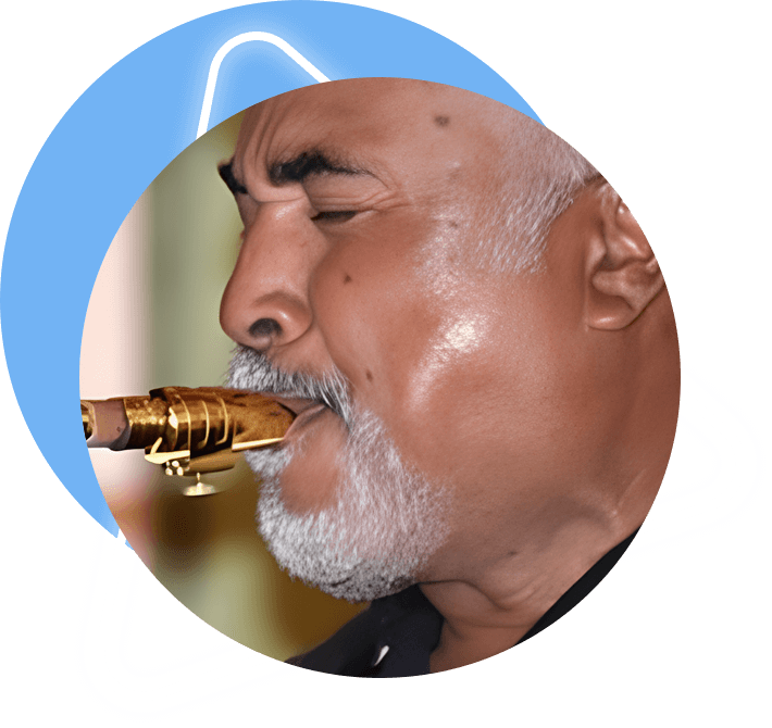 A man with a beard and mustache playing the saxophone